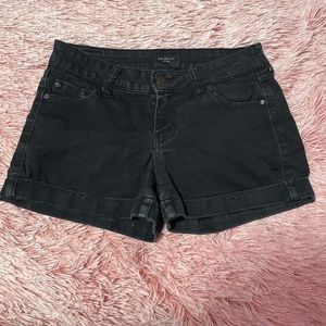Washed out black jean shorts.